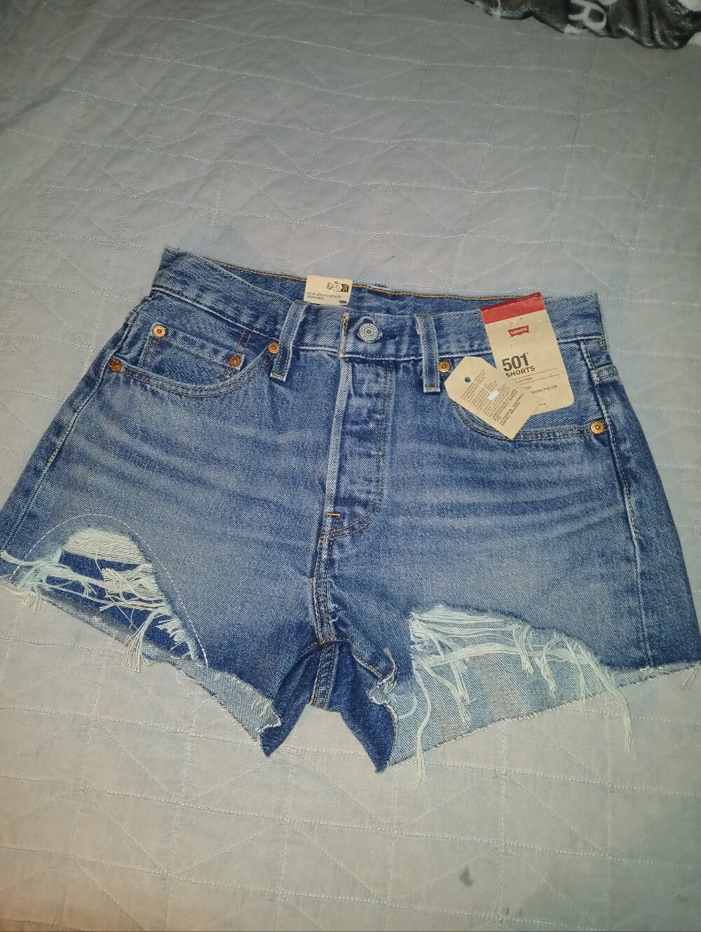 Levi's  501 Blue Distressed Denim Cutoff Shorts